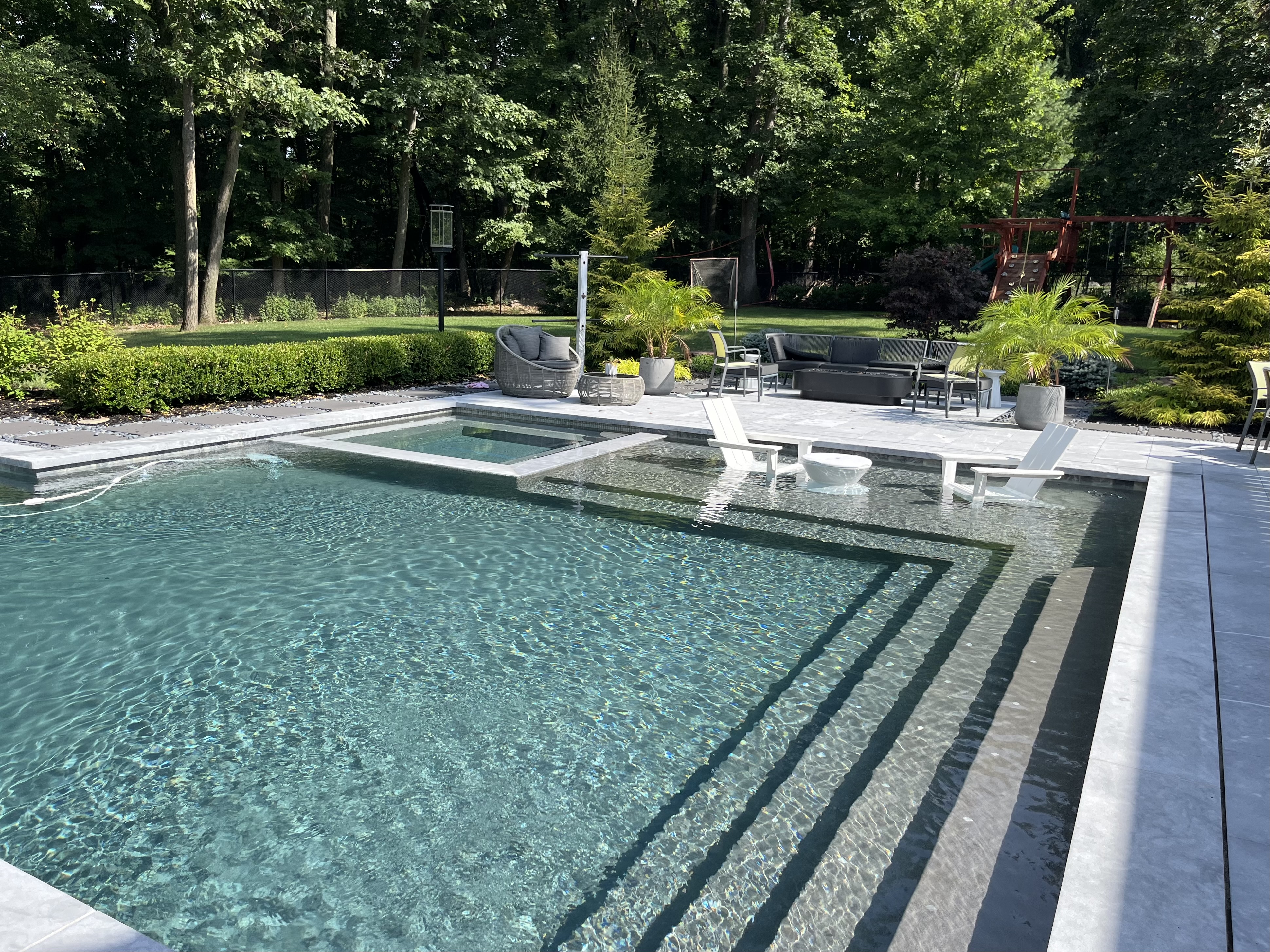 Rectangle pool with inground spa and tanning ledge