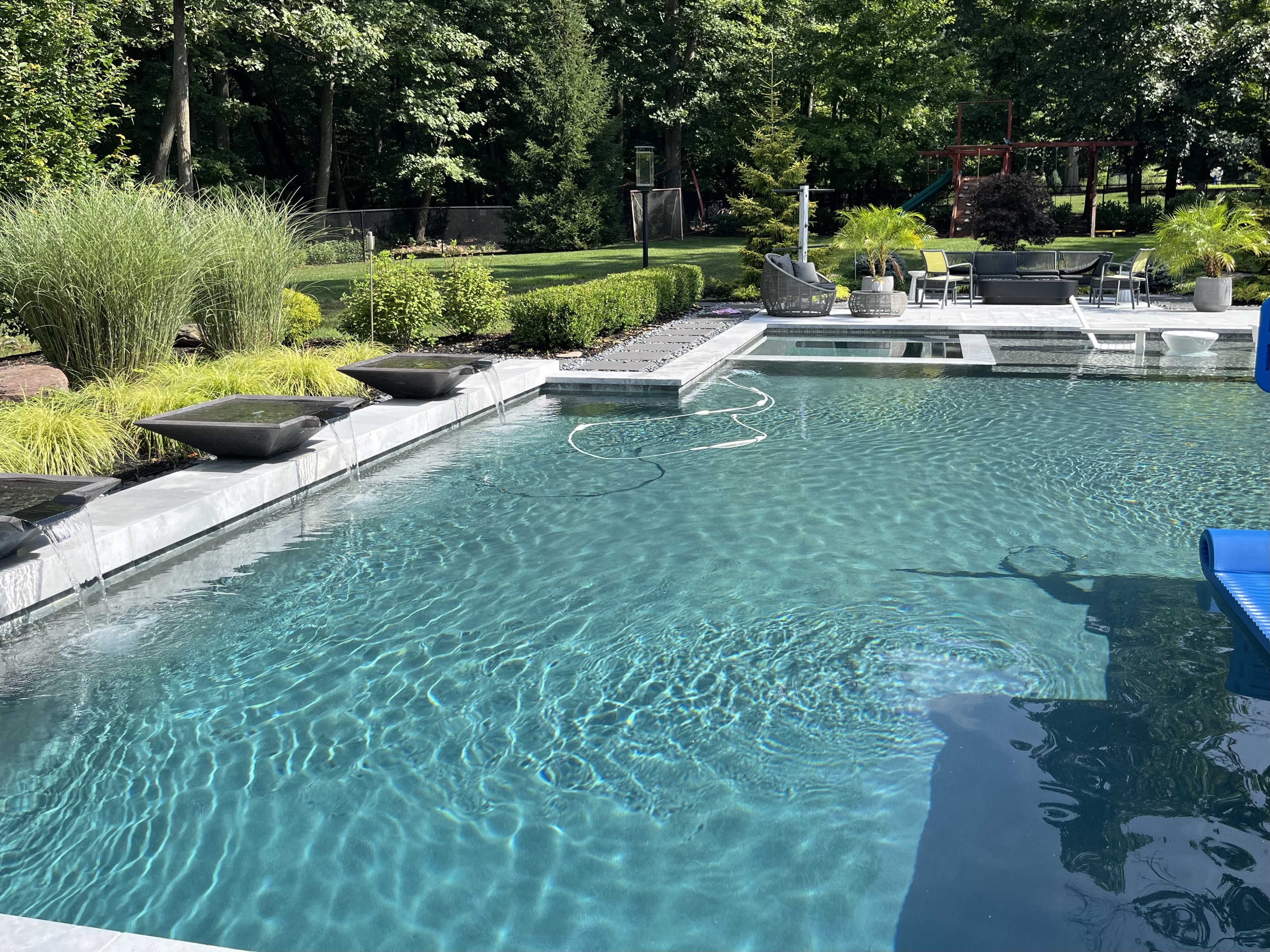 Rectangle pool with spa from water level