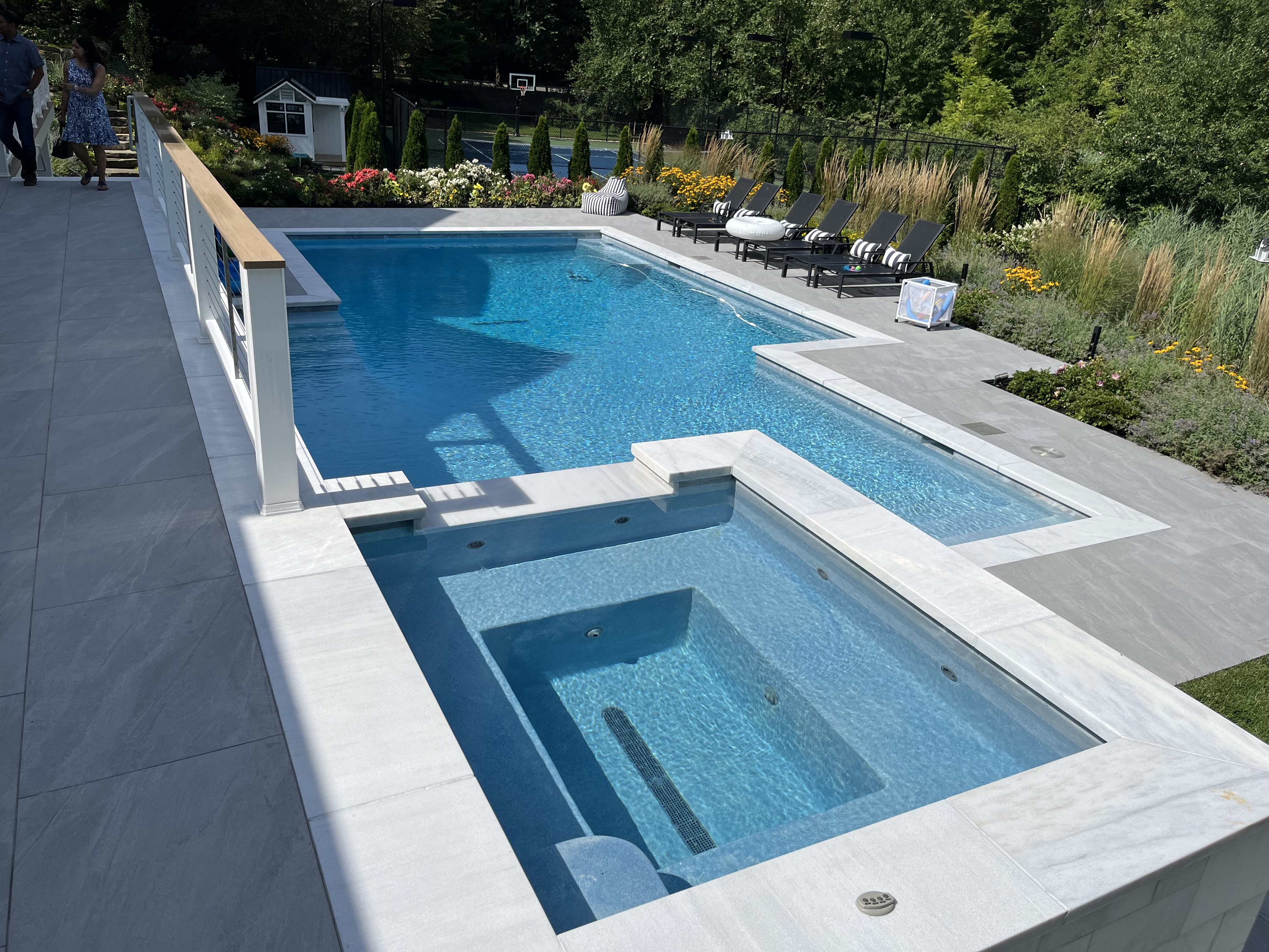 Rectangle pool with attached spa and diving platform