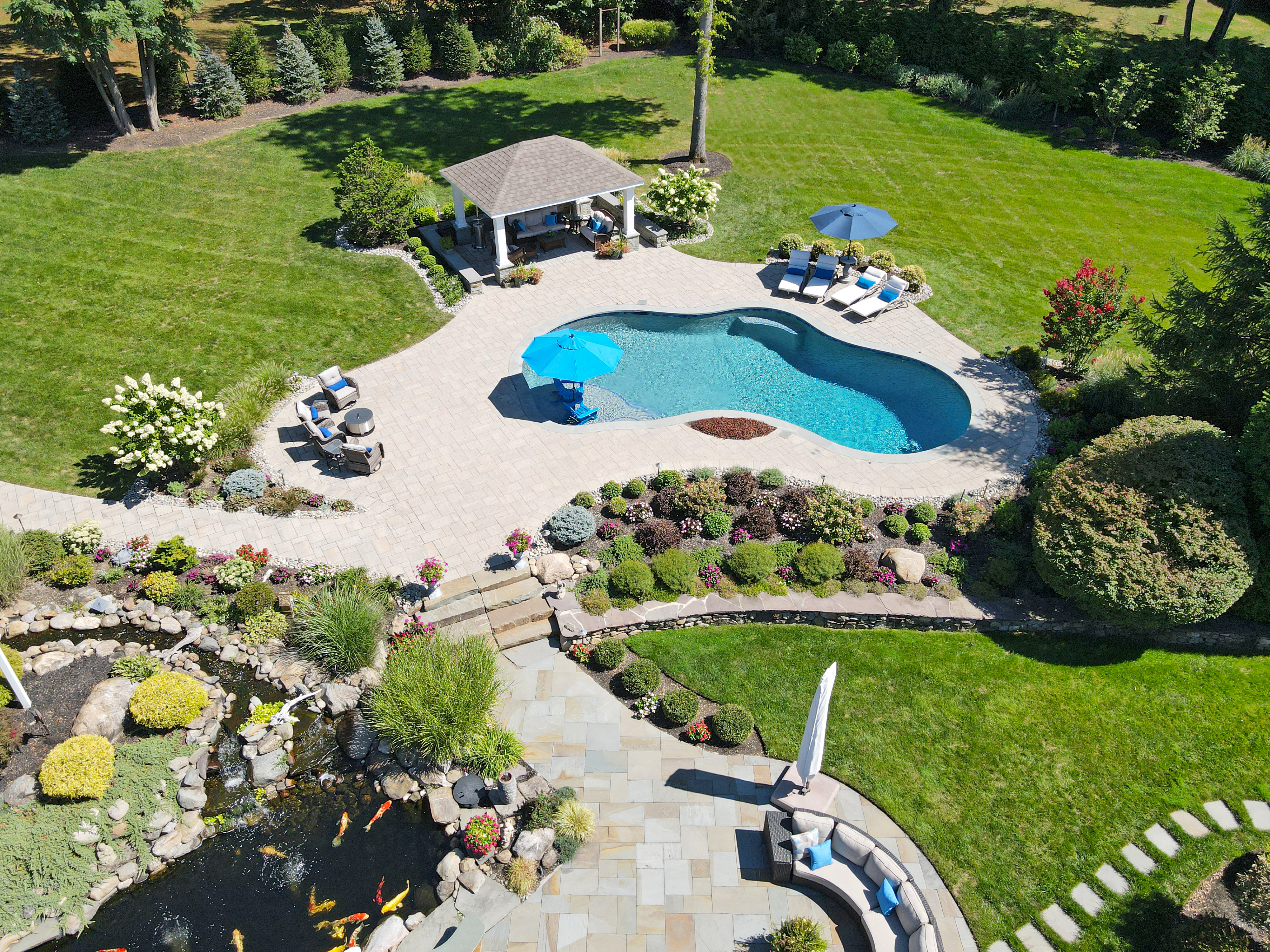 Drone aerial of full backyard pool build