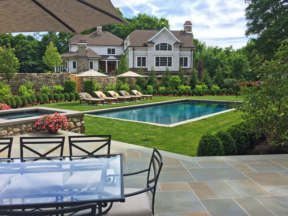 Estate rectangle pool with stone wall
